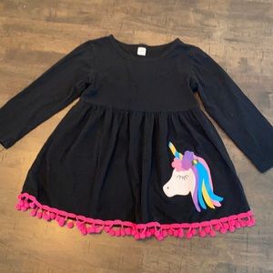 Black long sleeve unicorn shirt .